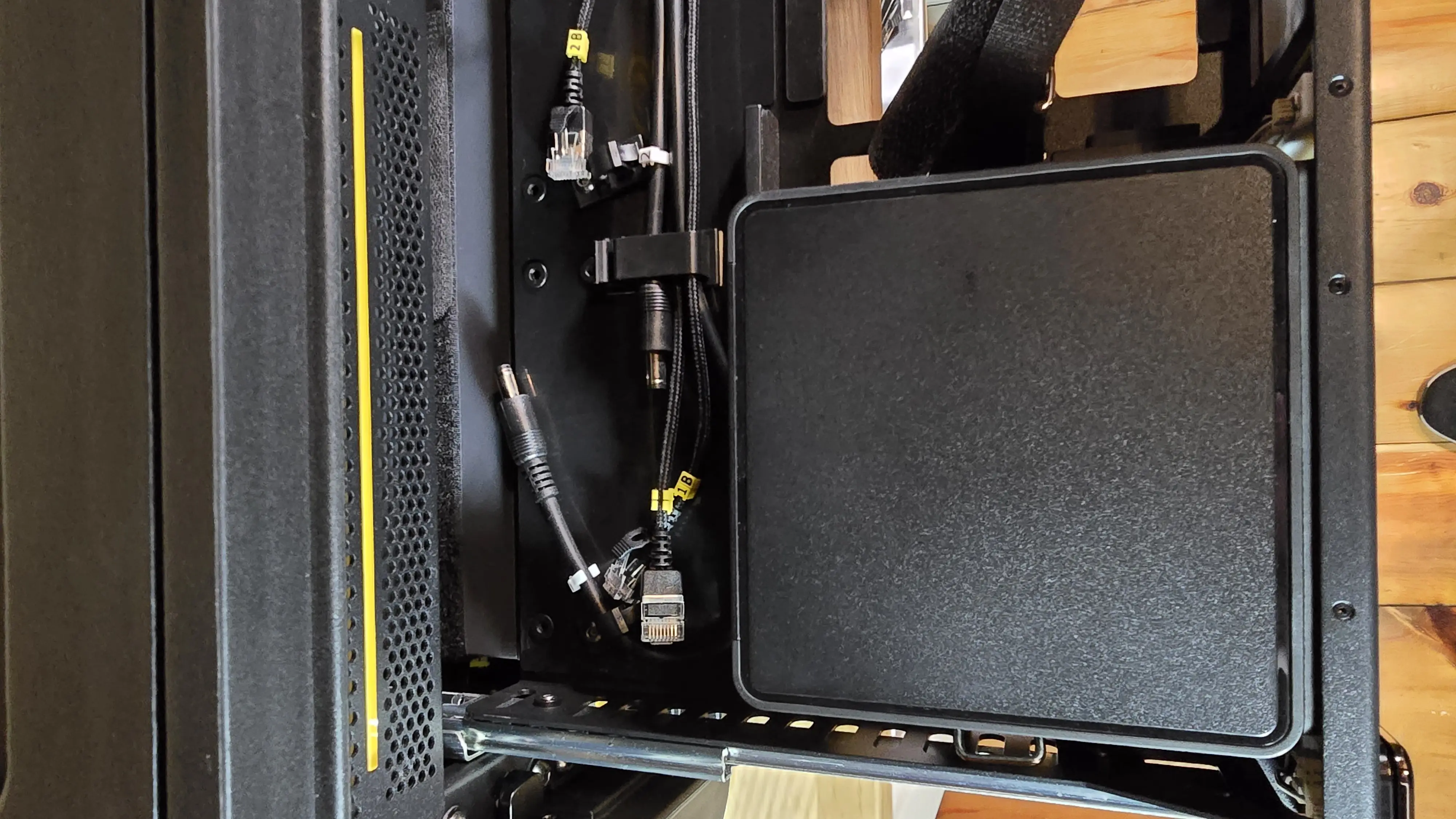 NUC positioned in bay, not yet secured